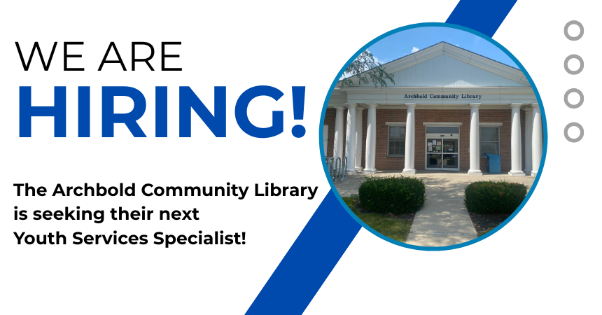 an image of the front of the library on  a sunny, summer day, featuring the Library's columns.